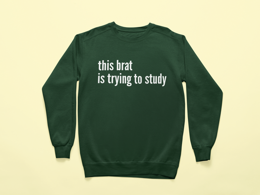 This brat is trying to study